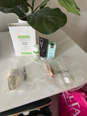 Farmacy skincare set with white and green packaging